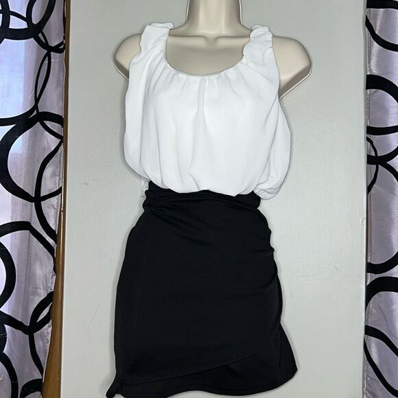 Women’s black and white color block dress with wrap skirt, size small - Picture 1 of 10